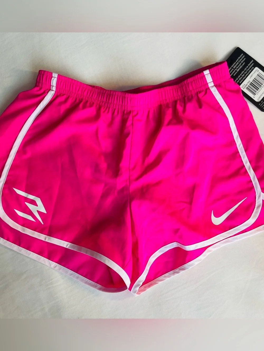 Nike Girls, Size Medium, Hot Pink Running Shorts with White Outline